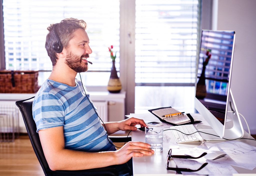 A person sitting at home office desk